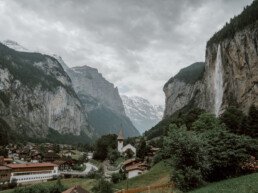 Interlaken, with the Tr&uuml;mmelbach waterfall and its massive mountain slopes