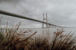 ponte vasco da gama lisbon on a cloudy day with gras