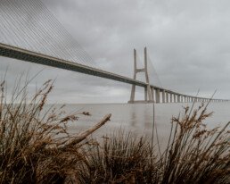 ponte vasco da gama lisbon on a cloudy day with gras